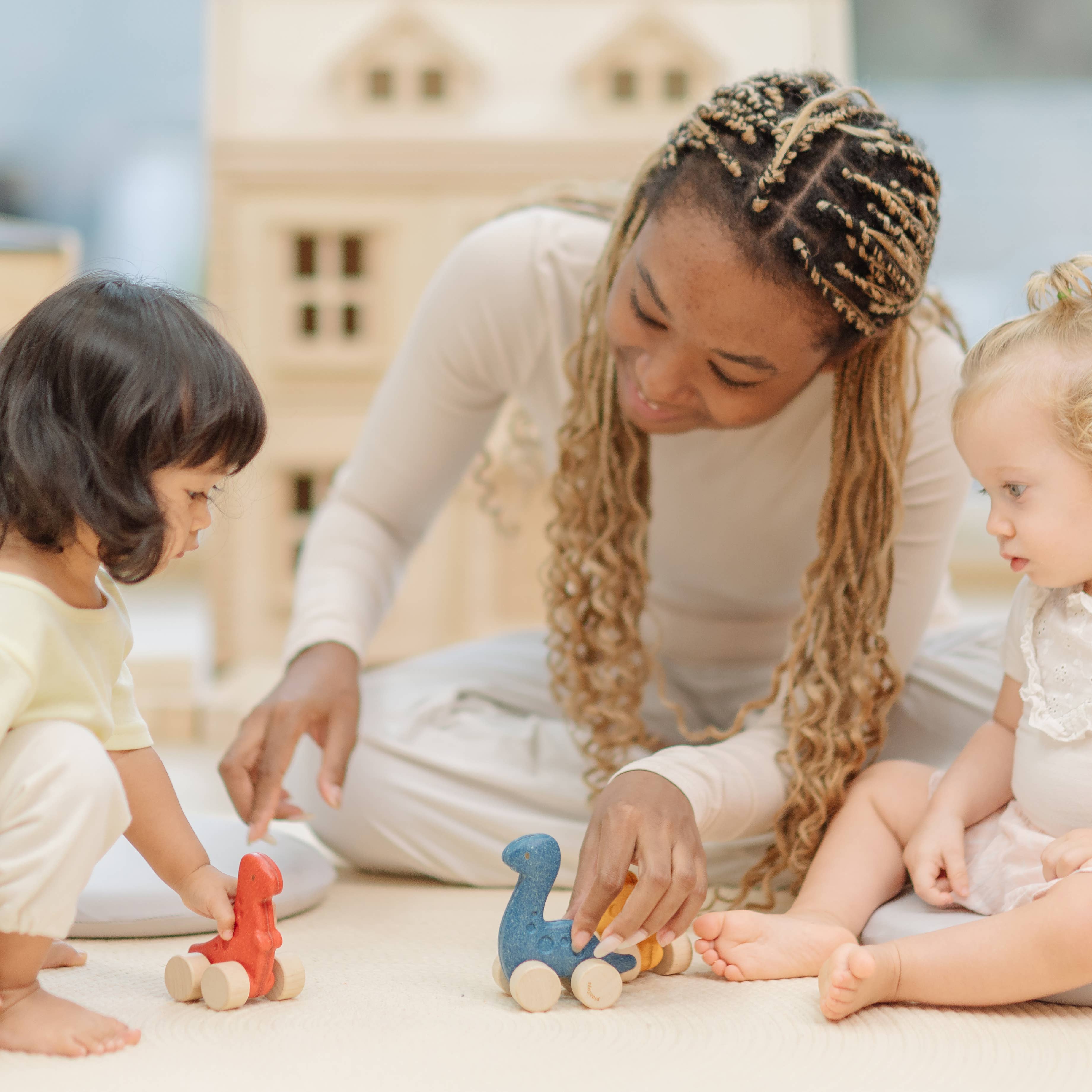 PlanToys Stego Dino Car Push Along Wooden Toy