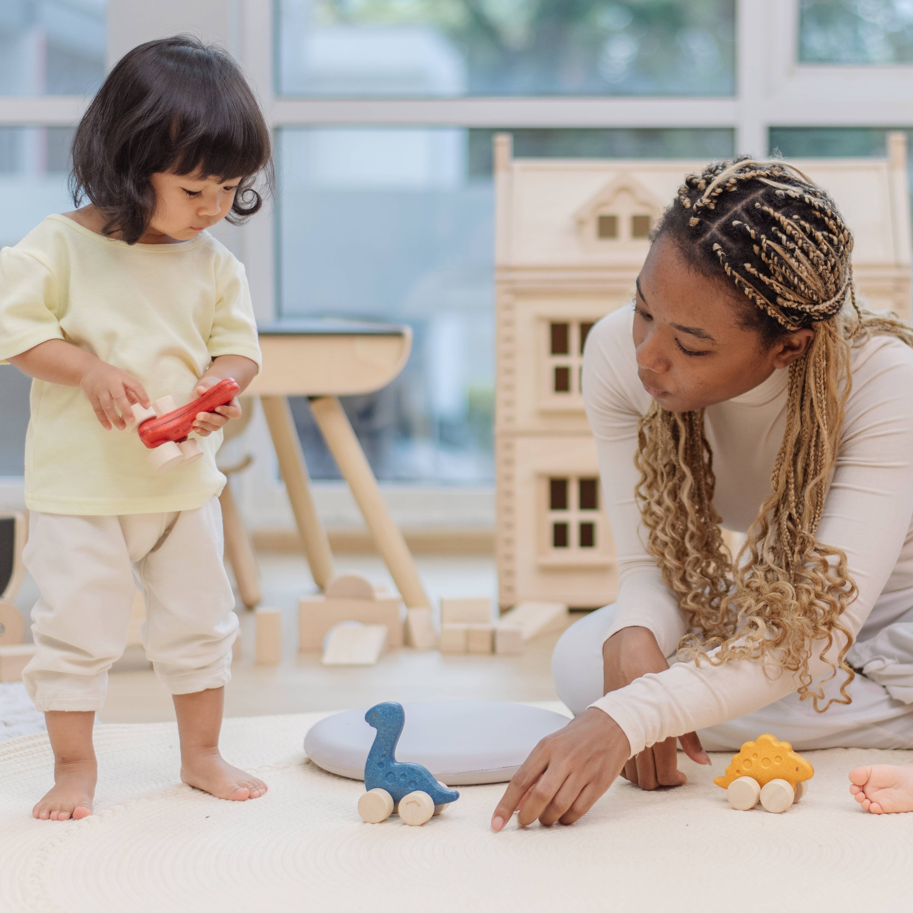 PlanToys Stego Dino Car Push Along Wooden Toy